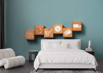 Shopping and e-commerce concept , Online shopping icon include searching mobile phone trolley discount credit card and delivery truck print screen on wooden cube block. Wall mural