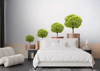 Trees on increasing coins stacking for money saving and business investment concept. Wall mural