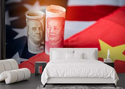 US dollar and Yuan banknote on USA and China flags. Its is symbol for tariff trade war crisis between United States of America and China which the biggest economic country in the world. Wall mural