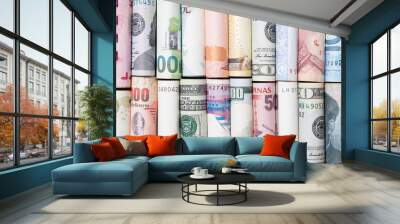 Various international banknotes roll in the world for currency exchange and transfer of forex concept. Wall mural