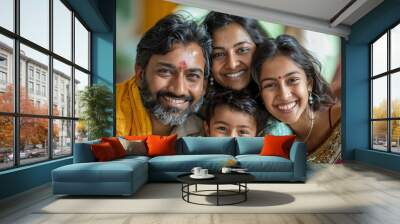 Cheerful Indian family with mother father and their two daughters and son Wall mural