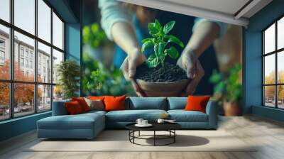 Woman Transplanting Plant into Ceramic Pot Wall mural