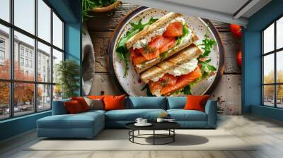 Salmon and cream cheese sandwich with fresh greens on a rustic plate Wall mural