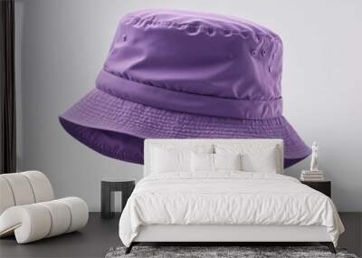 purple bucket hat mockup sits alone on a crisp white background, ready for summer adventures.  This cheerful hat is a perfect addition to any beach day or poolside relaxation. Wall mural