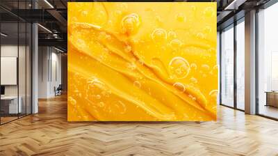 A macro shot of a yellow acrylic paint with air bubbles Wall mural