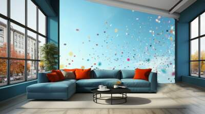 Colorful confetti on a sky background Wall mural