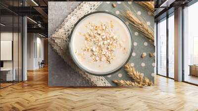 A glass of lean oatmeal milk Wall mural