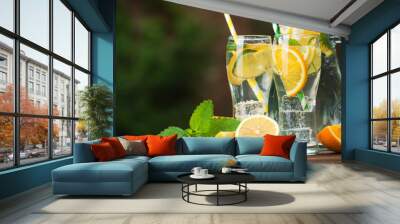 Orange mojito in glasses Wall mural