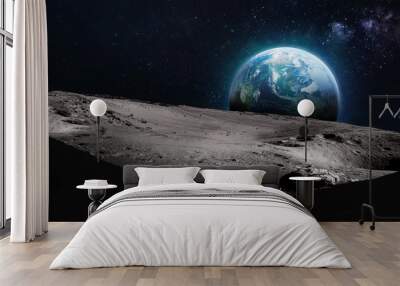 Moon surface with craters and Earth planet in deep space. Elements of this image furnished by NASA Wall mural