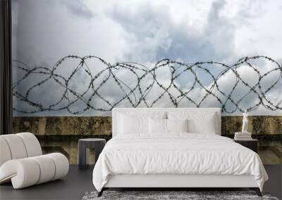 concrete wall with barbed wire Wall mural