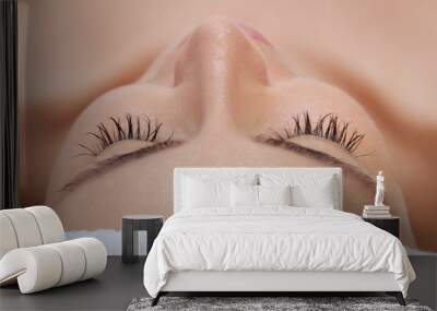 The procedure of steaming the skin of the face of a young woman before cleaning the skin in a cosmetology salon.Treatment of problem skin cosmetology concept. Wall mural