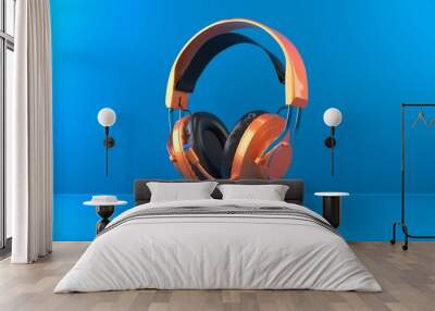 Orange metallic modern headset on bright blue background and stand Wall mural