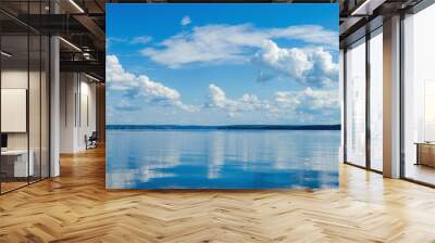 Panorama of calm lake, Kama river blue sky with clouds reflected in the water. Wall mural