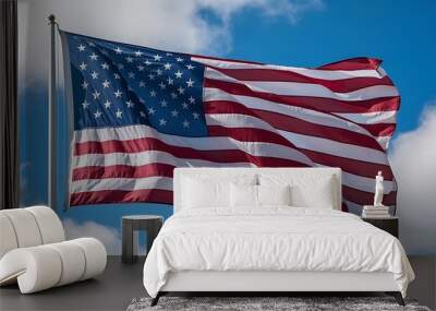 A vibrant United States flag waves against a partly cloudy sky, symbolizing American patriotism and national pride. Wall mural