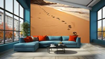 footprints in sand on the beach in the morning with beautiful light Wall mural