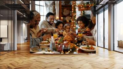 multigenerational black african american  family including grandchildren, parents  and grandparents enjoying a meal together at  table in living on thanksgiving or Christmas Wall mural