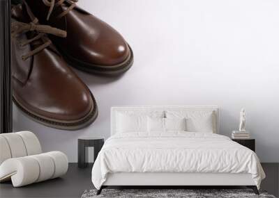 Brown male shoes on white background. Space for text. Male fashion. Wall mural