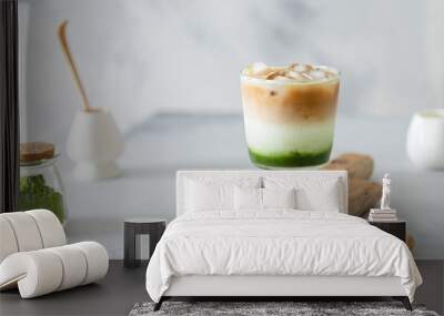 Matcha green tea espresso, matcha green tea with milk, ice and coffee on a wooden board. Layered matcha drink. Fresh summer drink. Side view, copy space. Menu, recipe Wall mural