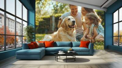 Smiling father, mother and daughter petting and playing with purebred Labrador dog. The sun is shining on an idyllic happy family with a cute dog having fun in the backyard of an idyllic country house Wall mural