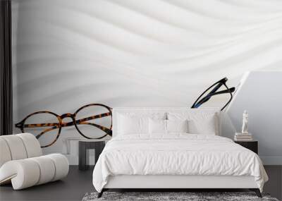 two pairs of plastic eyeglass frames on white background. minimalism, eyewear fashion concept. trend Wall mural