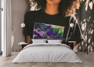 pixelated Graphic Tee. A model wearing a graphic t-shirt with a pixel art design Wall mural