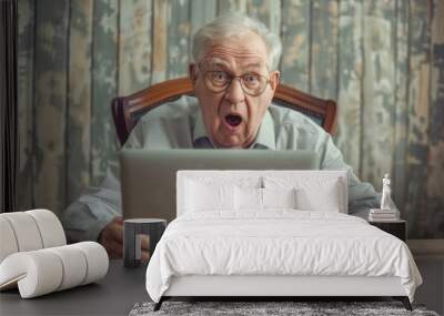 Senior retired man  looking shocked and surprised using laptop at home minimal interior with wooden panels Wall mural