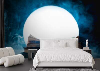 An open book of spells in full Moon. Reader imagination and writing inspiration concept with copy space Wall mural