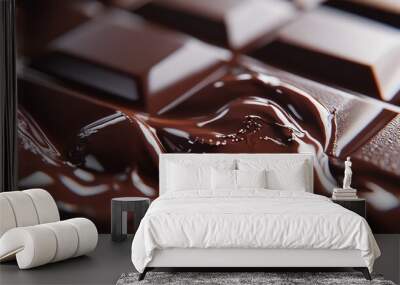 A close-up of melted chocolate, with a smooth, glossy surface. The chocolate is rich and decadent, with a hint of sweetness. Wall mural