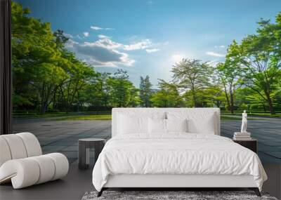 Empty square floor and green woods natural scenery in city park Wall mural