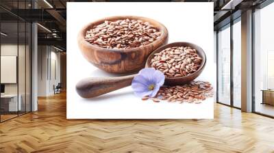 Flax seeds with flower in closeup on white background Wall mural