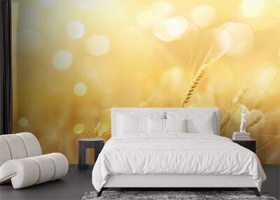 Golden wheat field background with bokeh and sunlight, summer concept of harvest season Wall mural