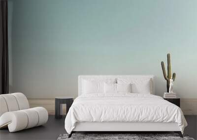 Minimalist desert landscape with lone cactus, muted tones, clean horizon against sky Wall mural