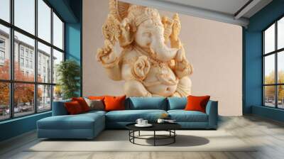 Hindu God Ganesha. Ganesha Idol on background Wall mural