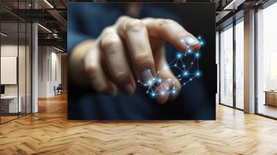 A finger touches an illuminated web of digital connections, symbolizing technology and interaction in a modern world. Wall mural