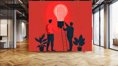 Two people stand near a ladder, one holding a large lightbulb while the other carefully adjusts its position on a red wall. Decorative plants are placed on either side, enhancing the setting. Wall mural