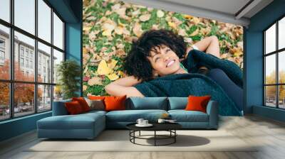 Afro hair style woman daydraming in autumn Wall mural