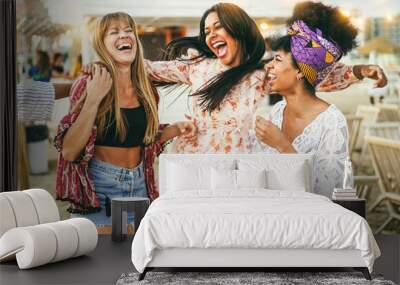 Multiracial happy friends having fun outdoor at beach party - Soft focus on african girl hair Wall mural