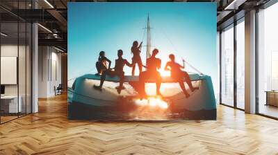 Silhouette of young friends chilling in catamaran boat - Group of people making tour ocean trip - Travel, summer, friendship, tropical concept - Focus on two left guys - Water on camera Wall mural