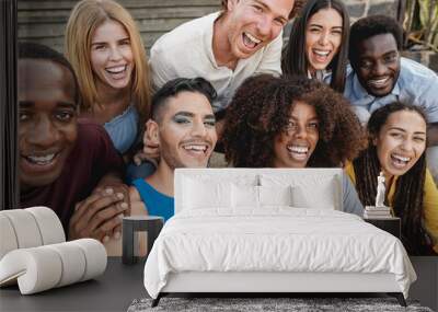 Young diverse people having fun outdoor laughing together - Focus on gay man face Wall mural