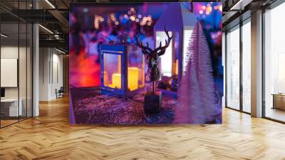 Deer and candle decoration of a christmas corporate or wedding event in Eastern Europe Latvia Riga - Dark violet and purple colors Wall mural