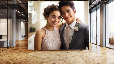 Radiant Young Couple at a Formal Prom Event, Embracing with Joy Wall mural