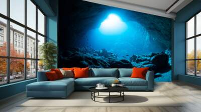 Rays of sunlight into the underwater cave Wall mural