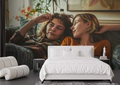 Calm relaxed mom and teen daughter resting on couch hands over head, mother chilling with teenage girl looking and smiling at each other, Generative AI Wall mural