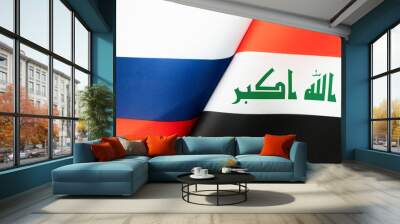 Flags of iraq, russia. The concept of international relations between countries. The concept of an alliance or a confrontation between two state governments. Friendship of peoples. Wall mural