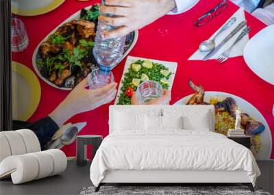 Arabic muslim family eating together Wall mural