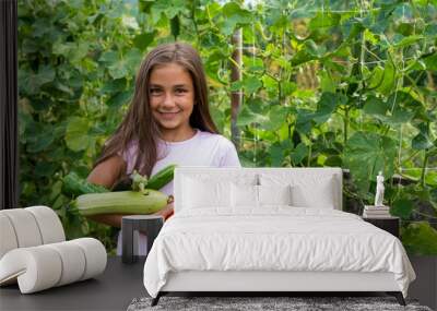 Little girl in vegetable garden Wall mural