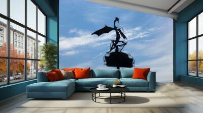 Iron forged dragon against the sky Wall mural