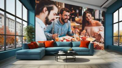 Group of Happy friends having breakfast in the restaurant Wall mural