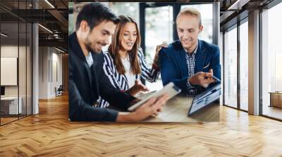 small group of young people at a business meeting in a cafe Wall mural