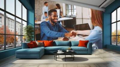 Young black man in a job interview Wall mural